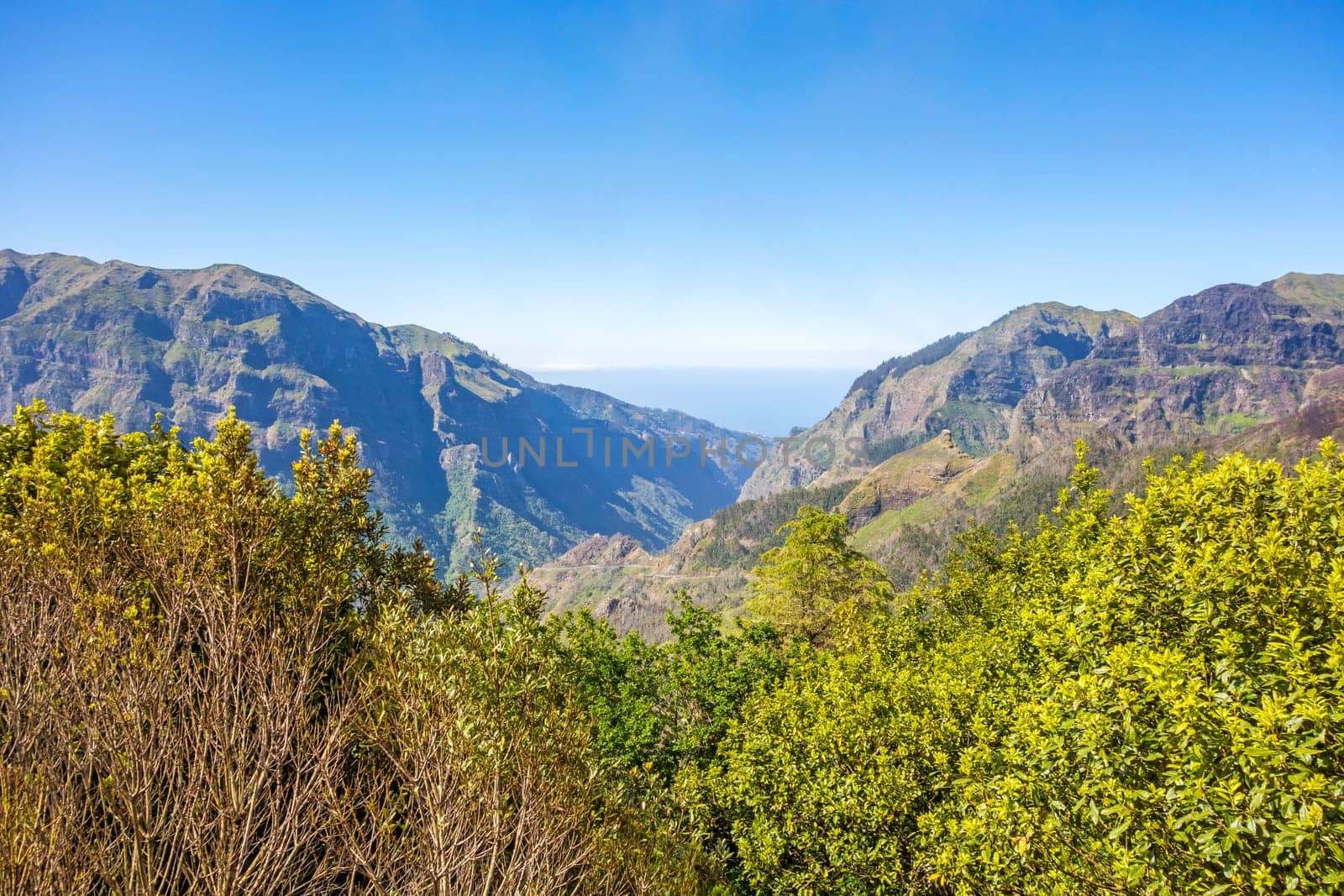 Mountain landscape in the north-west of the island Madeira near Ribeira de Janela - view to the atlantic ocean