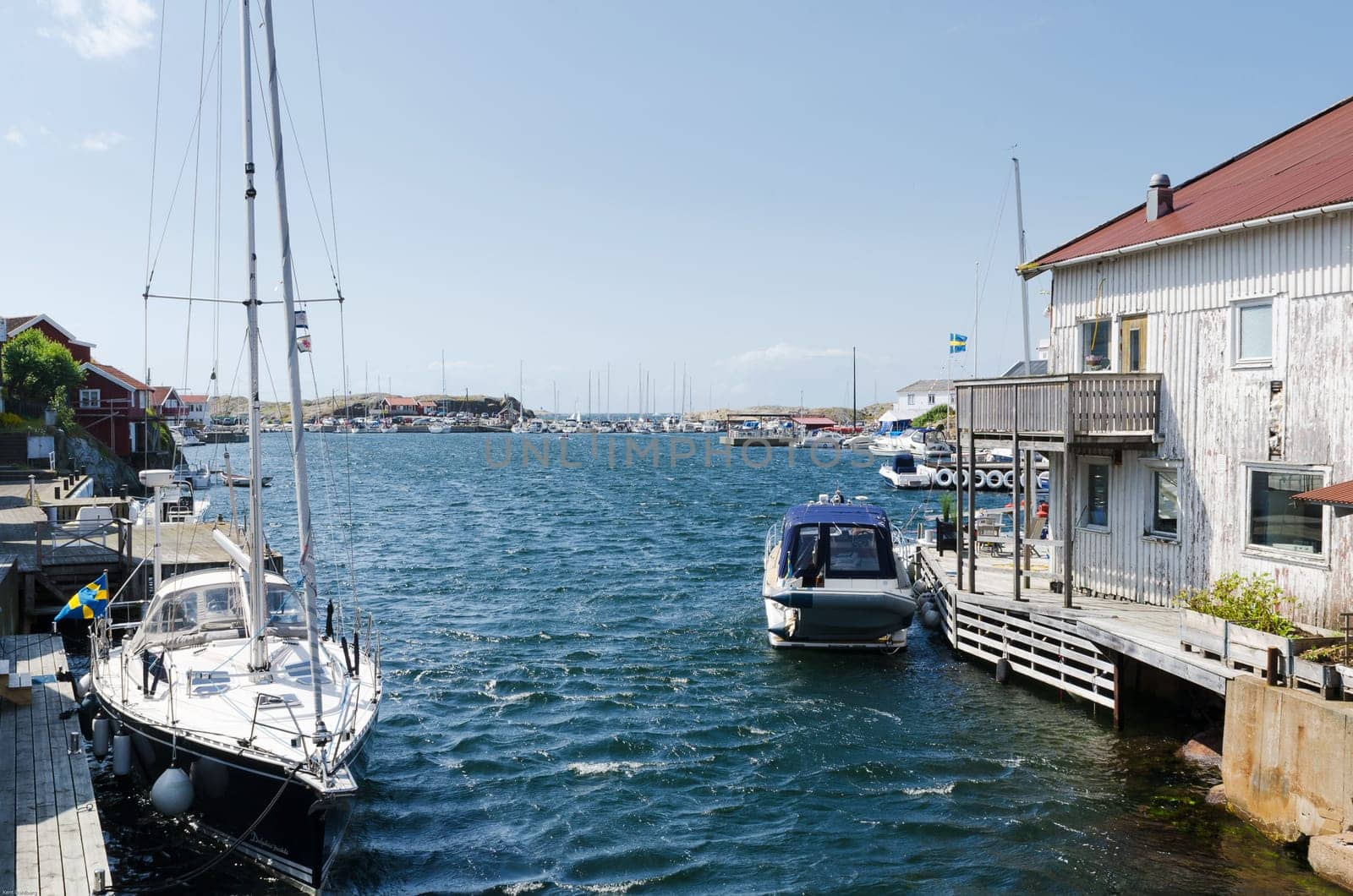One harbour on the swedish westcoas many boats wait for stop blowing