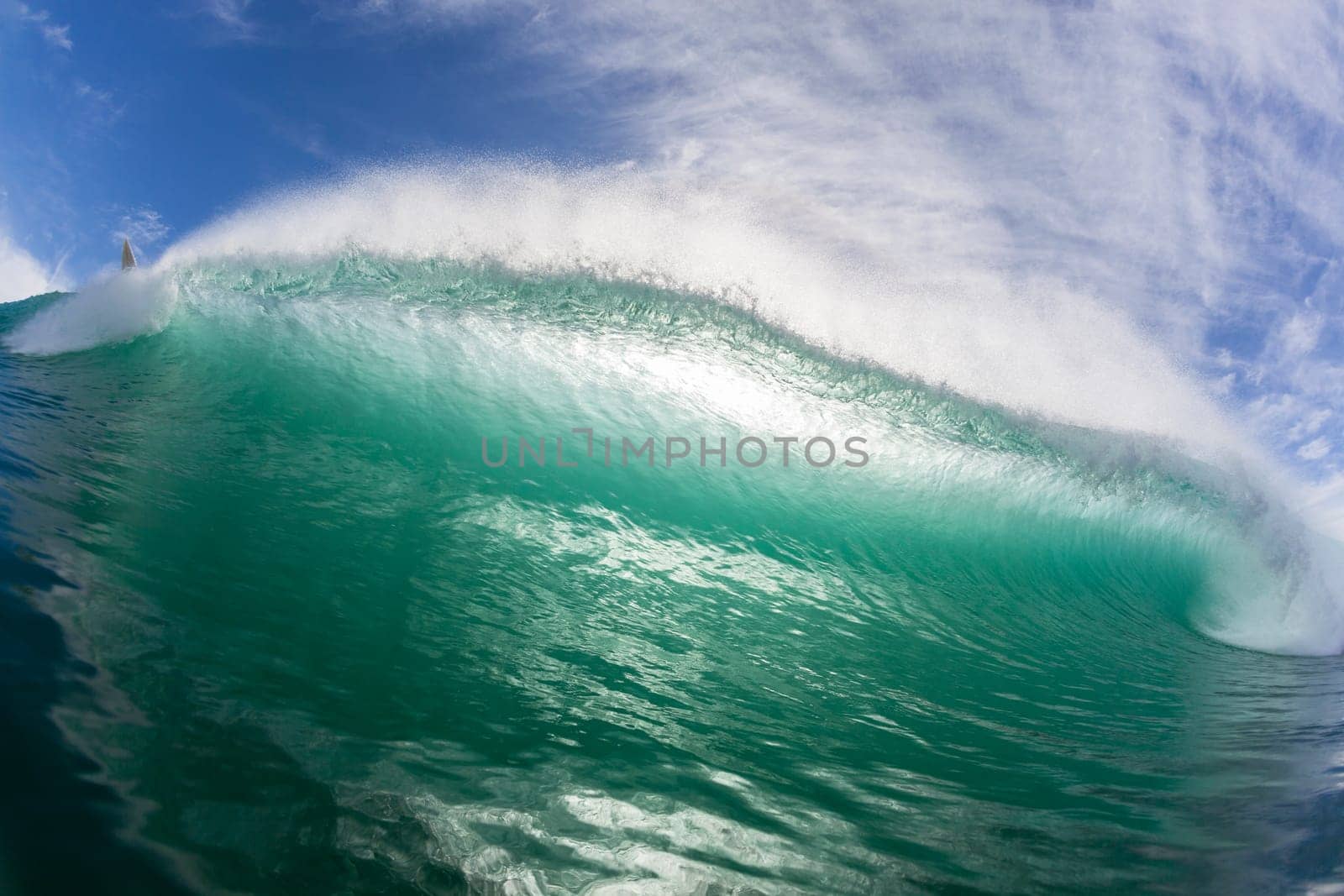 Wave crashing hollow face to face swimming ocean encounter.