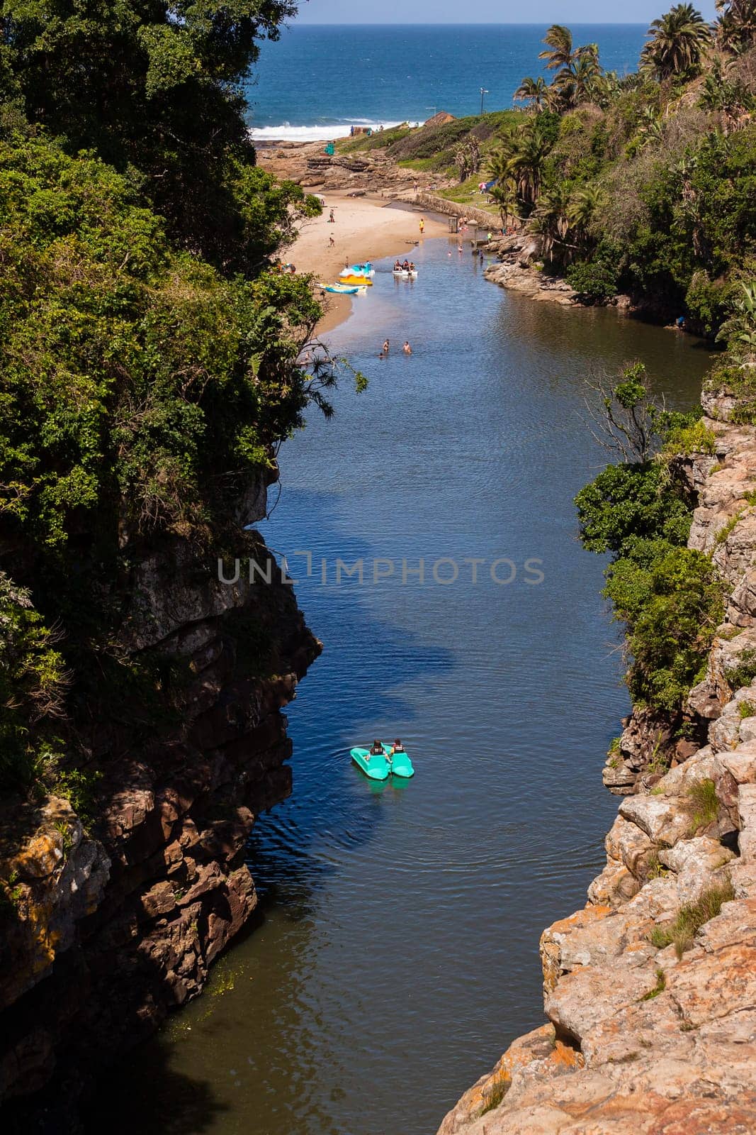 Rugged scenic beauty holiday destination of uvongo waterfall cliffs ravine lagoon beach ocean landscape