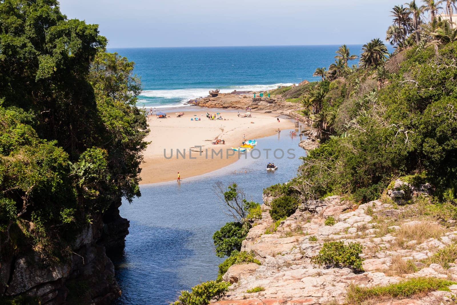 Rugged scenic beauty holiday destination of uvongo waterfall cliffs ravine lagoon beach ocean landscape