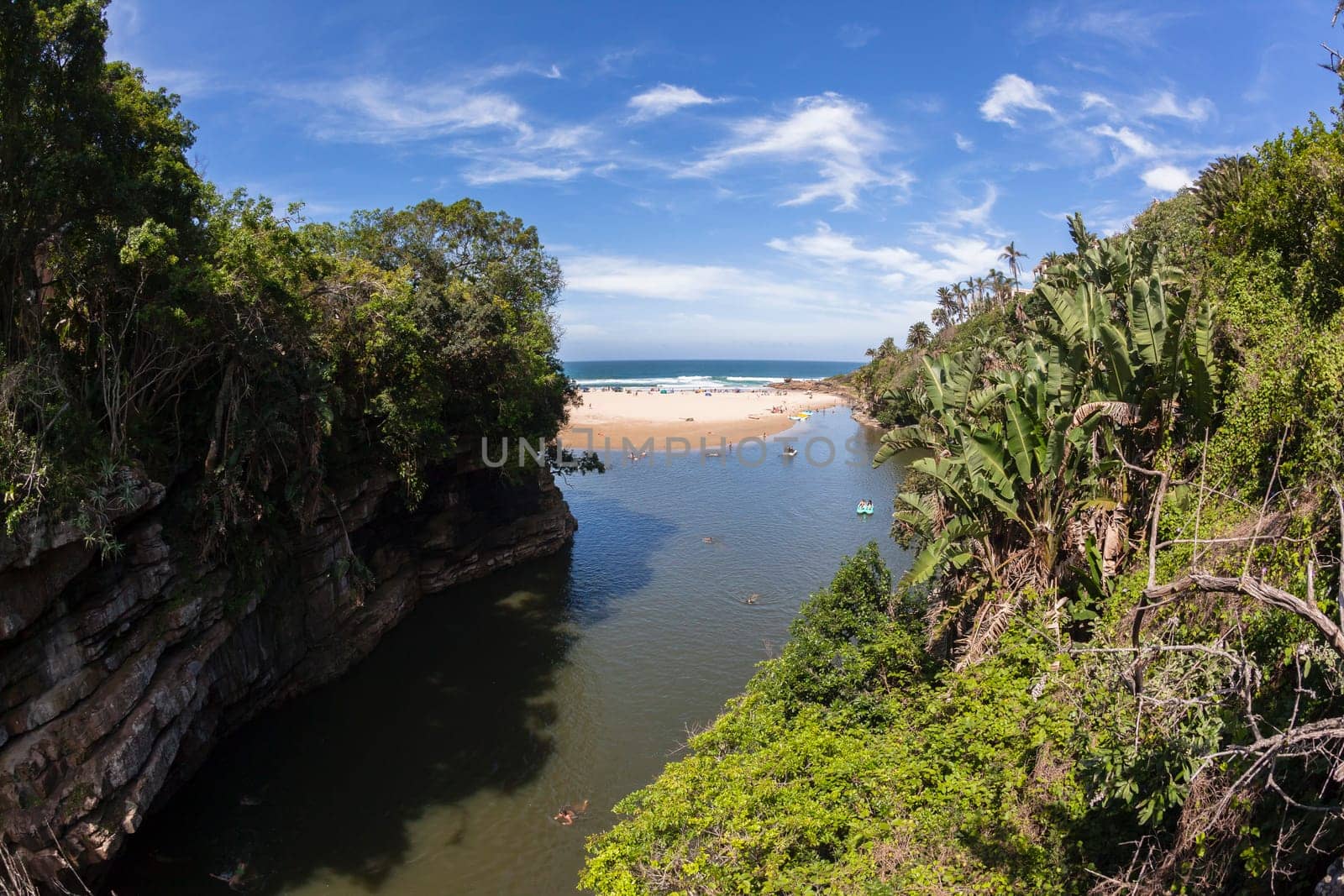 Rugged scenic beauty holiday destination of uvongo waterfall cliffs ravine lagoon beach ocean landscape