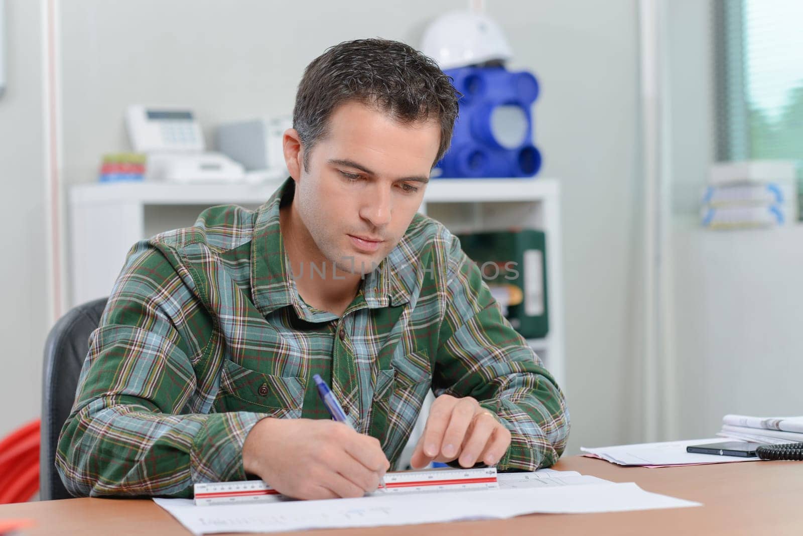 Architect drawing up plans