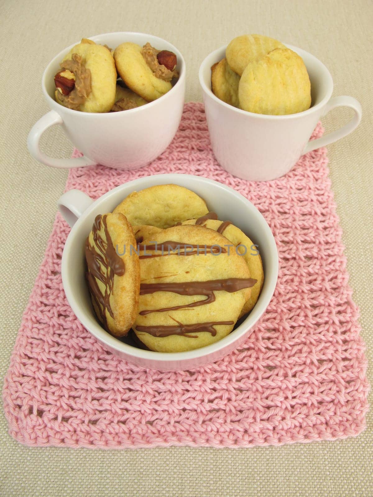 Cups filled with cookies