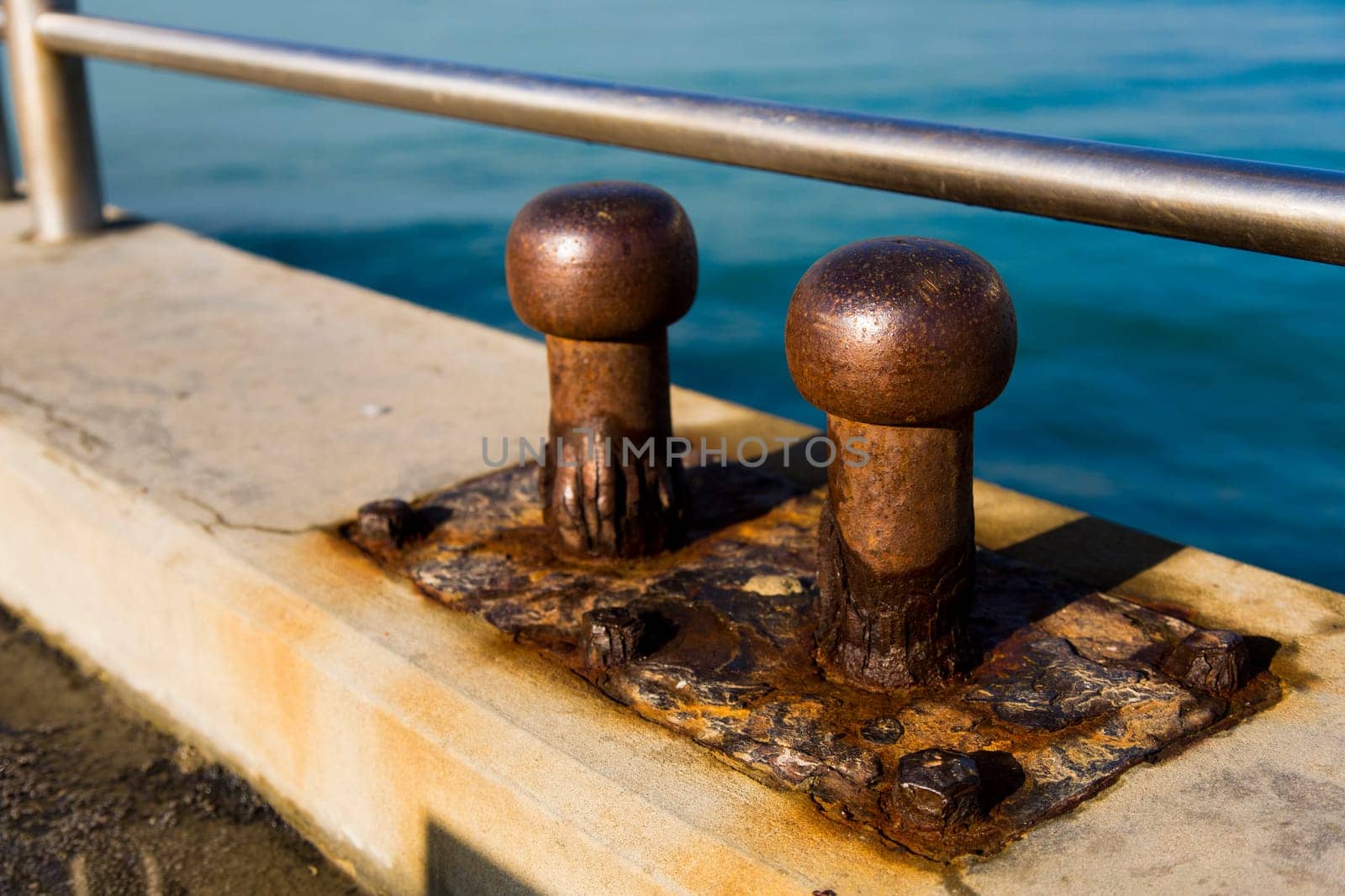 Close up view of two old cleats by salt