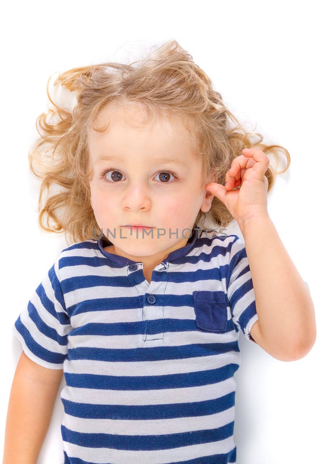 Cute little boy on white background.