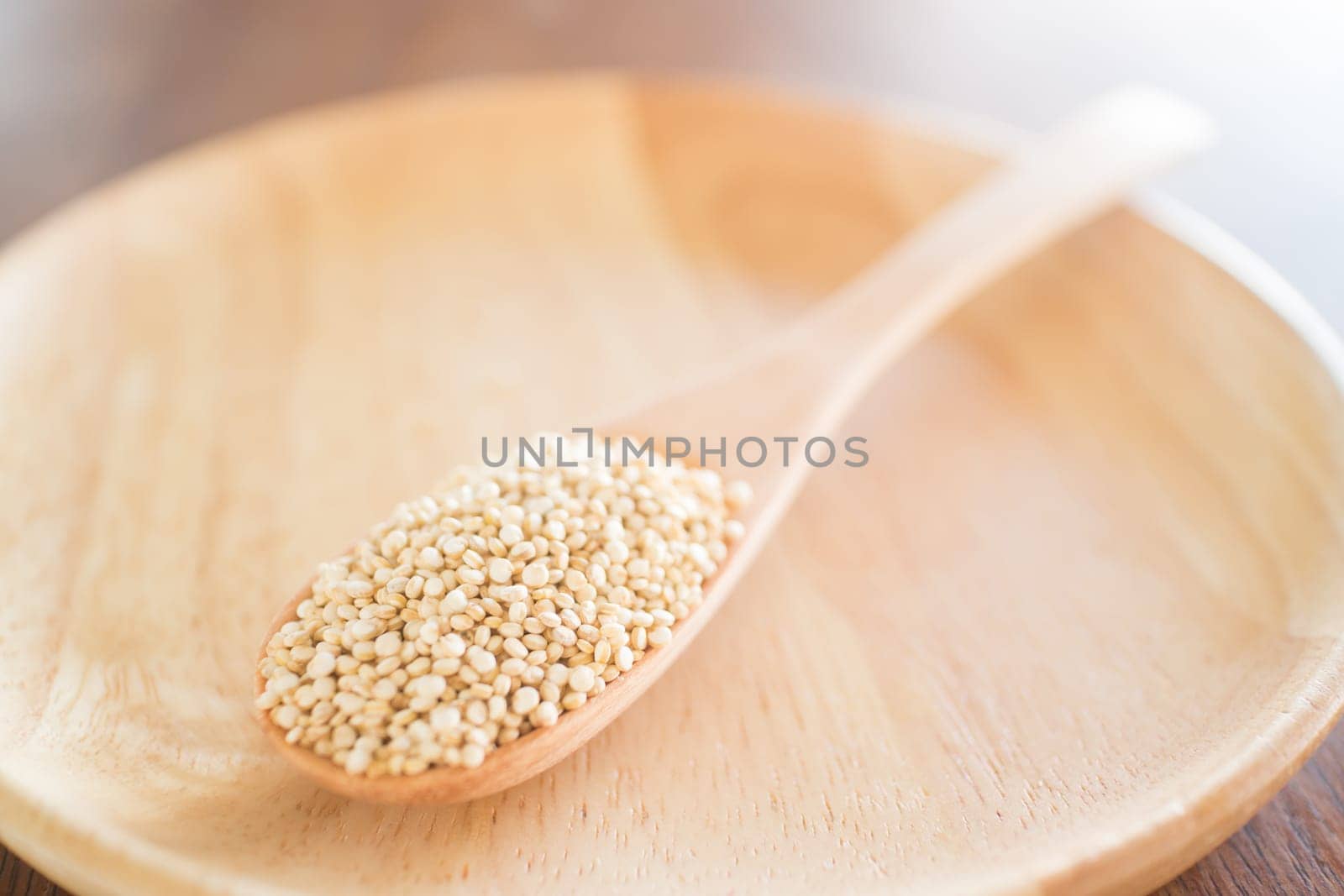 Raw organic white quinoa seeds, stock photo