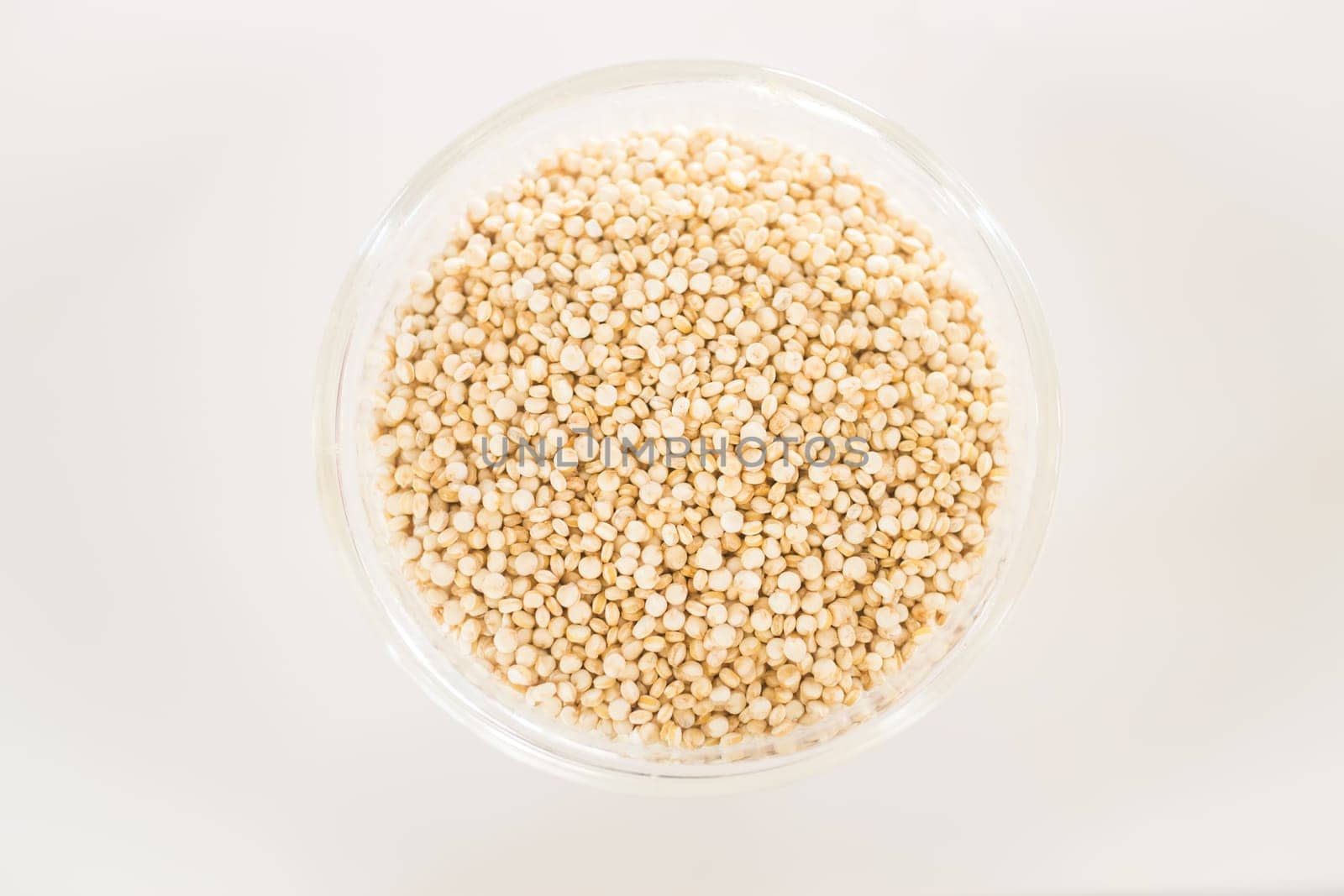 Raw organic white quinoa seeds, stock photo