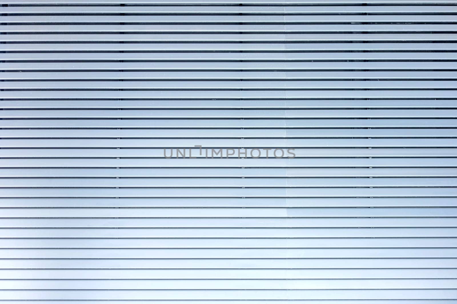 Grey blue metal / aluminium material background - horizontal lamellae