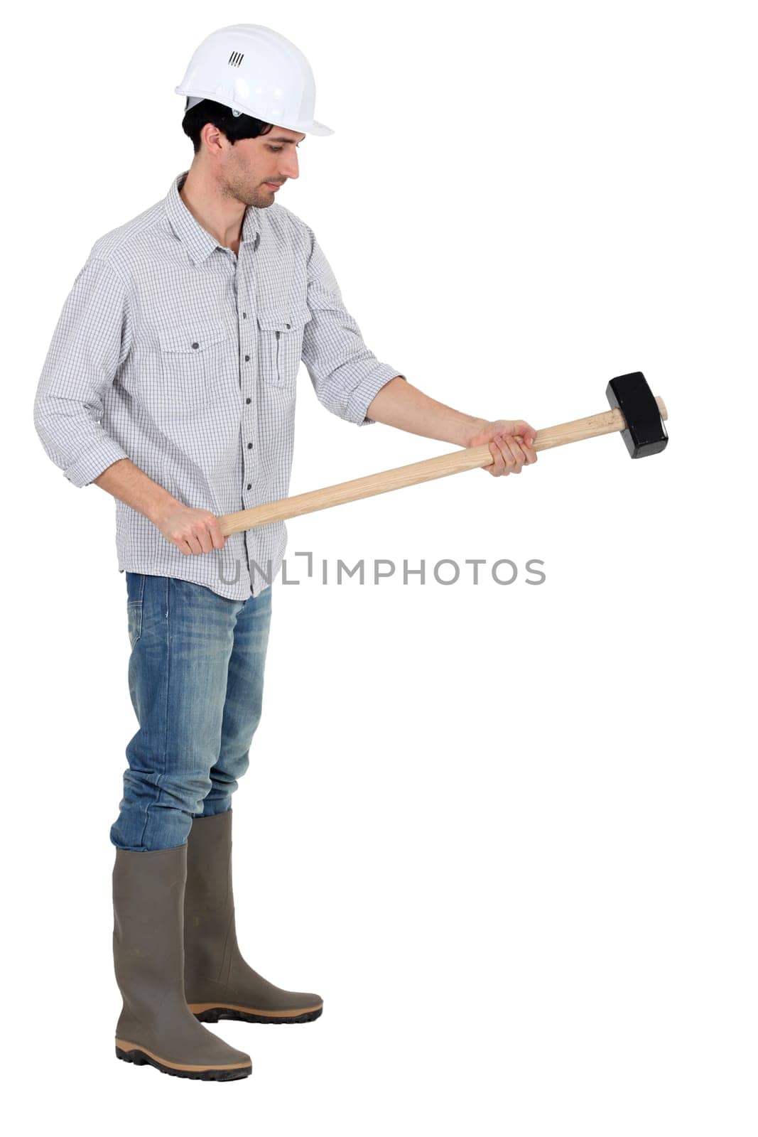 craftsman holding a hammer