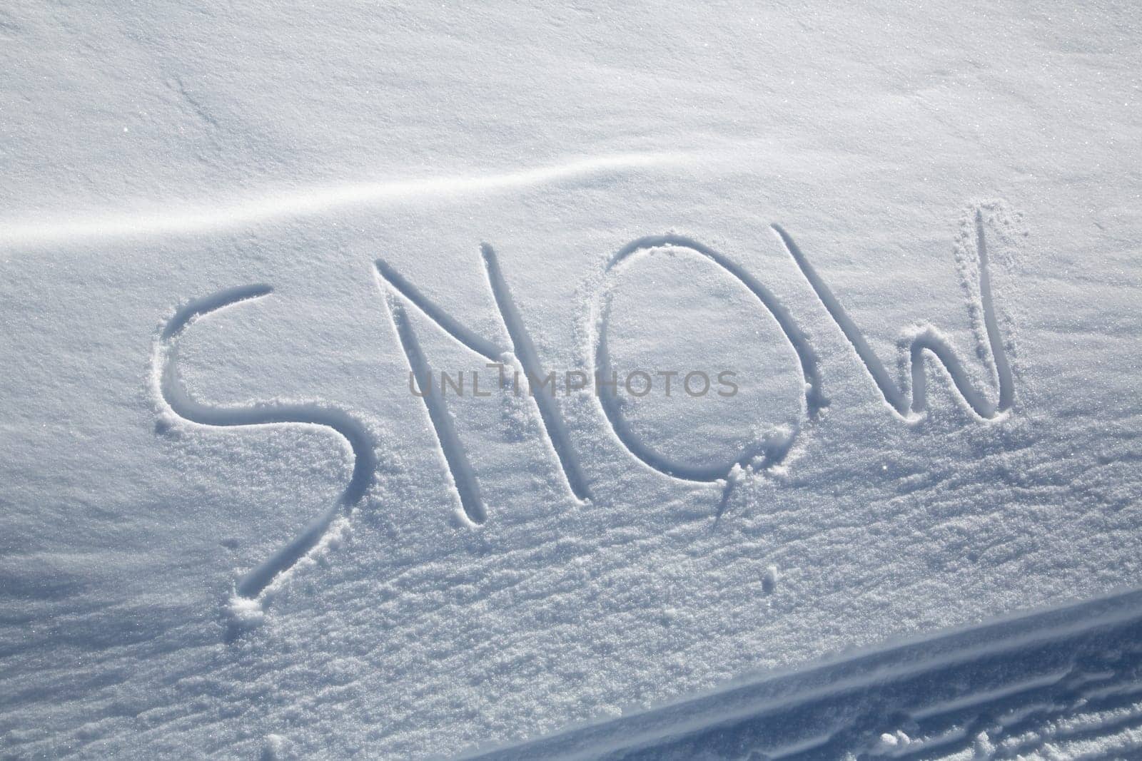 The word SNOW written in the snow