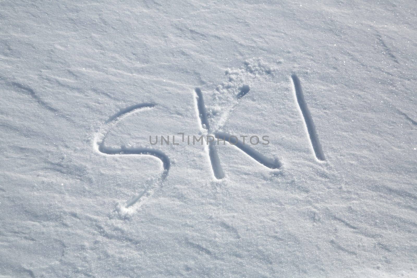 The word SKI written in the snow