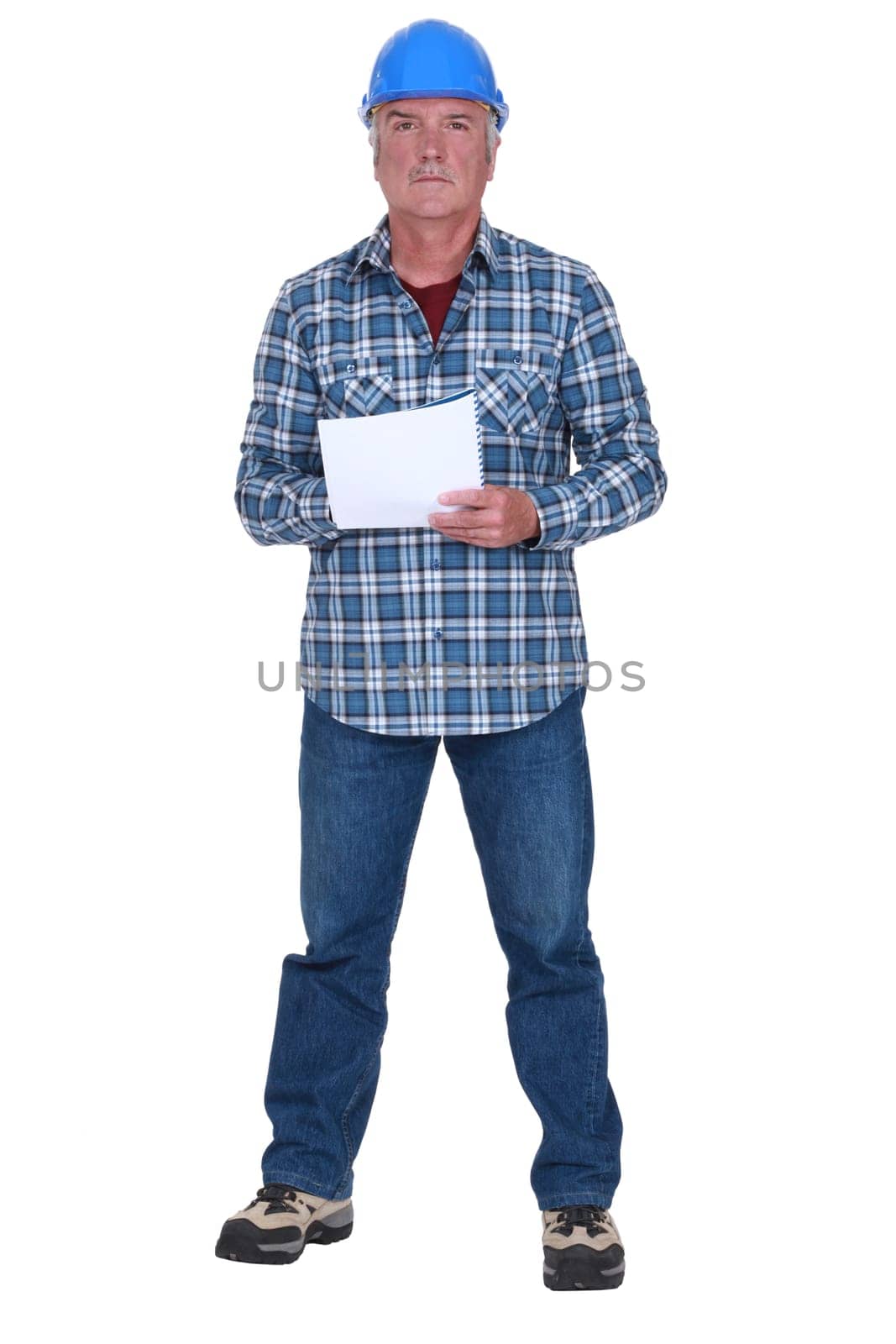 Craftsman holding paper