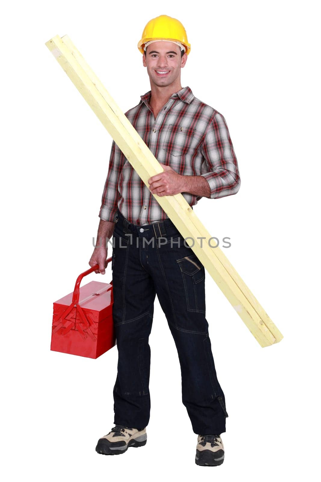 Tradesman holding a wooden plank