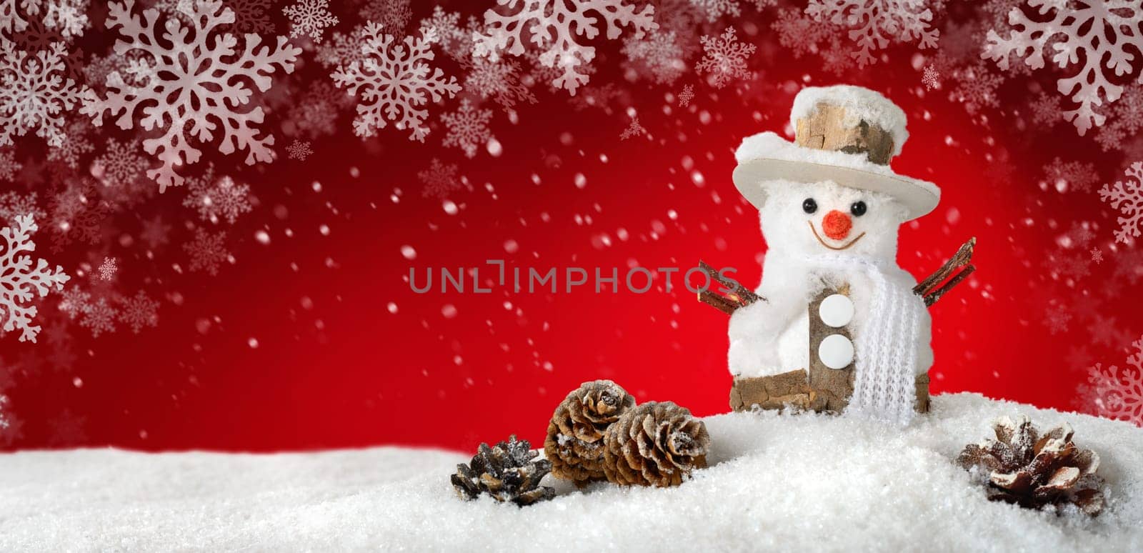 Modern red seasonal background with a cute happy snowman in the snow,ideal for Christmas or winter season
