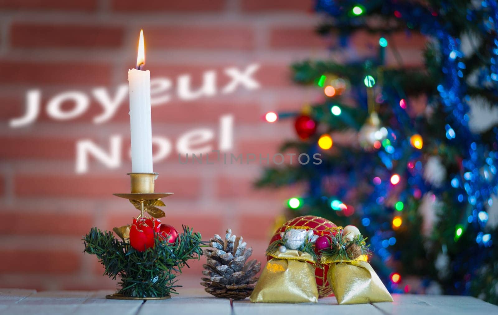 christmas decorations with candle and Christmas tree