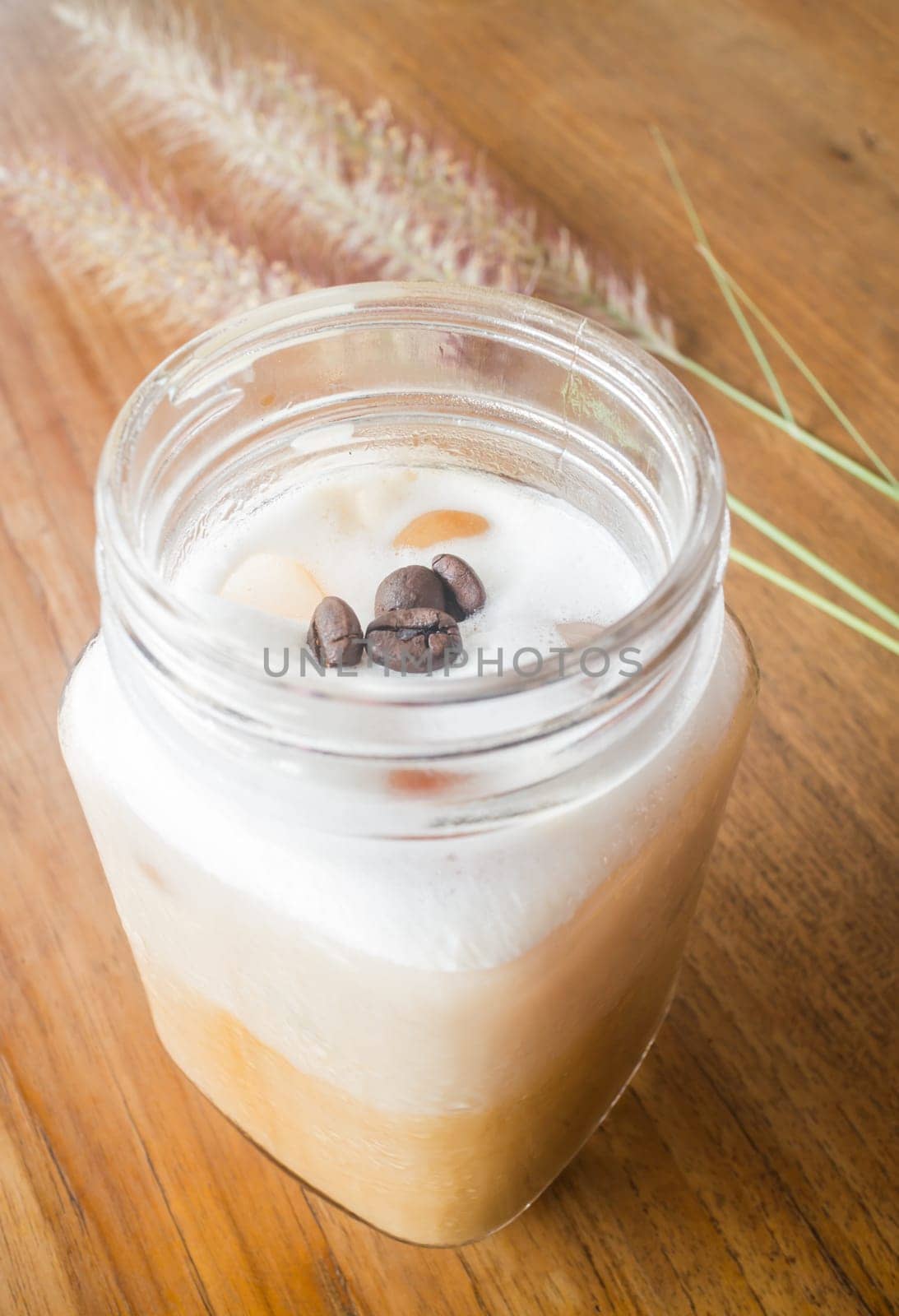Fresh iced coffee with milk, stock photo