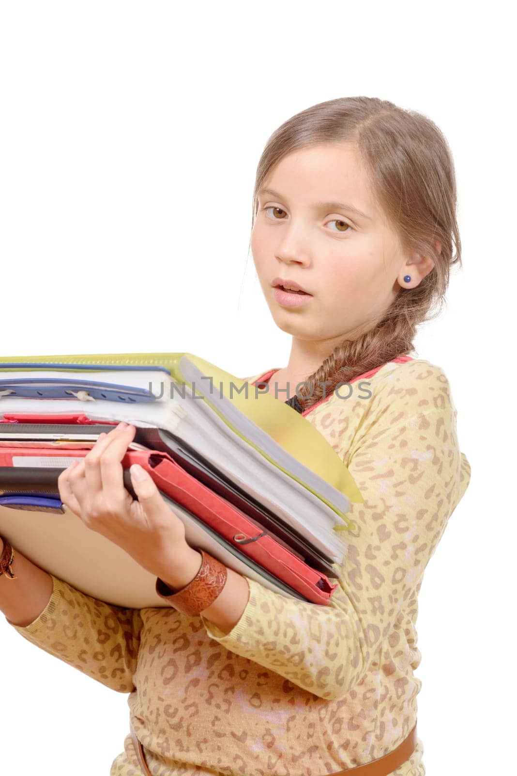 a schoolgirl carries many books, isolated on white background