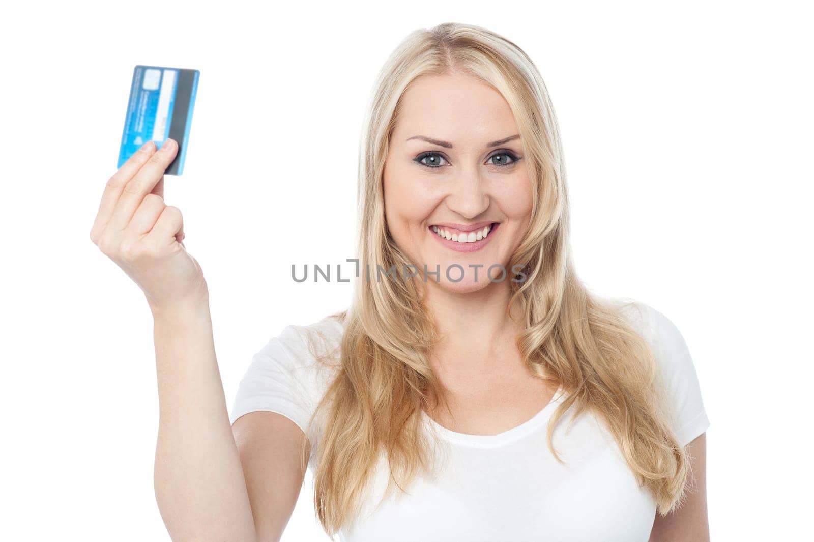 Beautiful smiling woman showing credit card