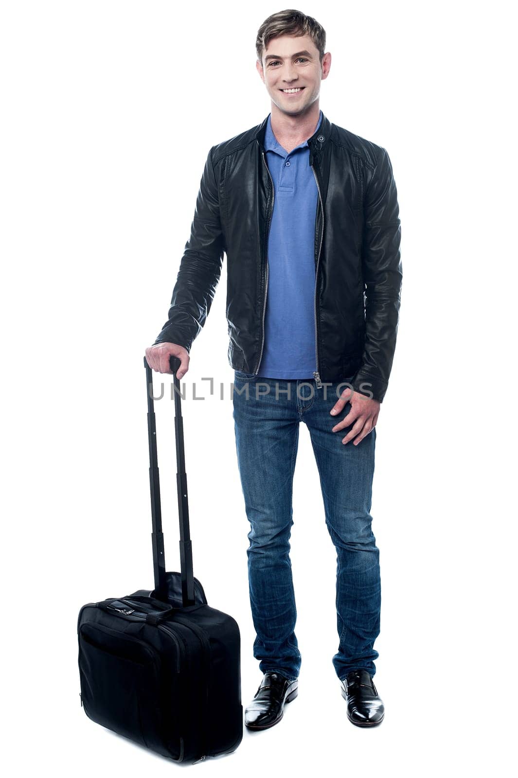 Confident cool guy posing with trolley bag