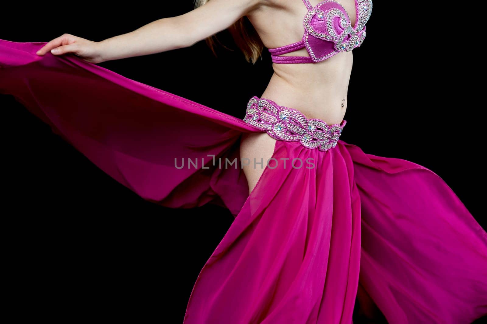 Cropped image of a belly dancer performing