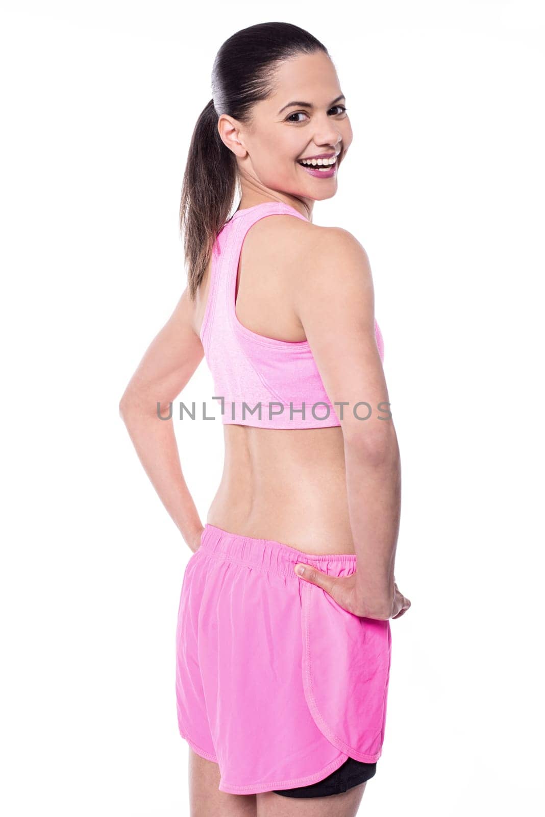 Charming female trainer posing in style