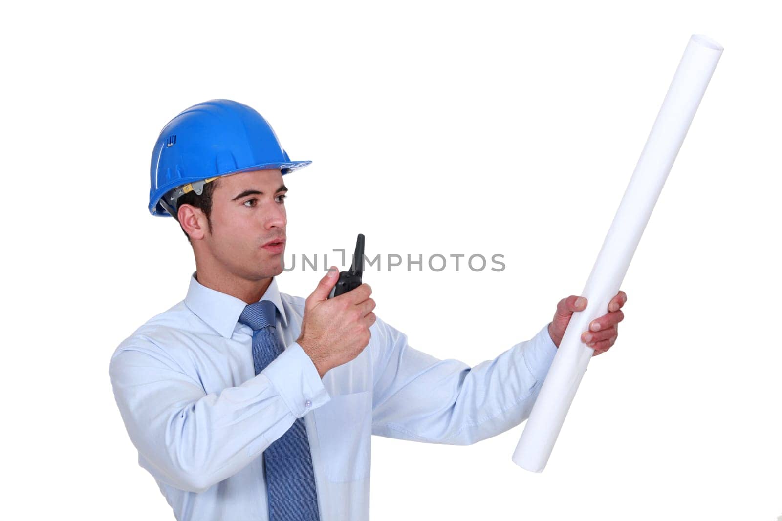 An architect giving instructions through a talkie.