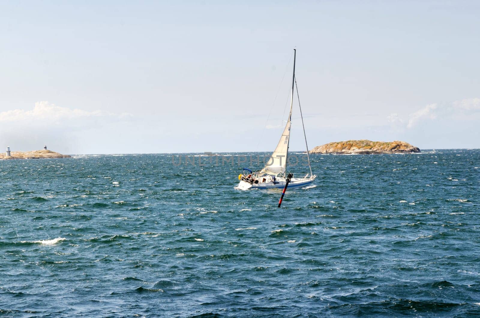 sailing a blowing day on westcoast in sweden one lonely boat