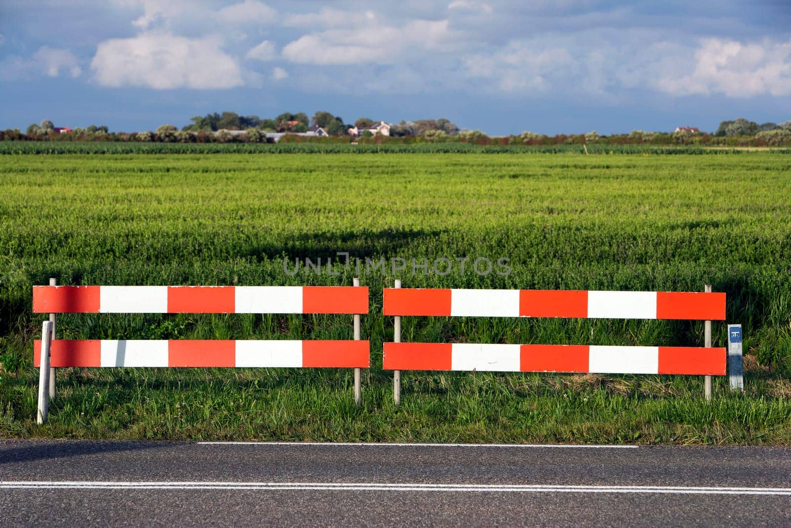 Barricade  between  country road and fields