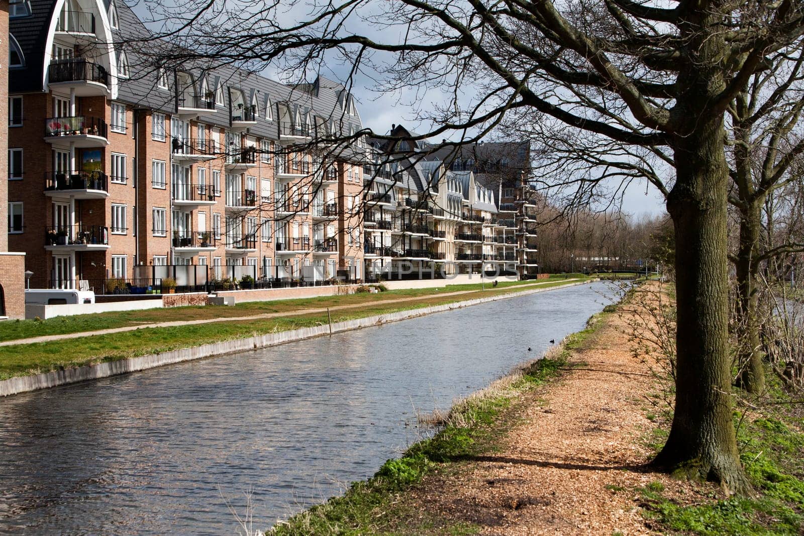 Nice Apartments in an apartment block with water view with a woodchips footpath along the water.