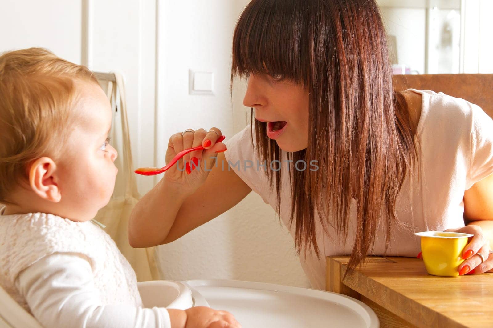 Mother feeding her baby