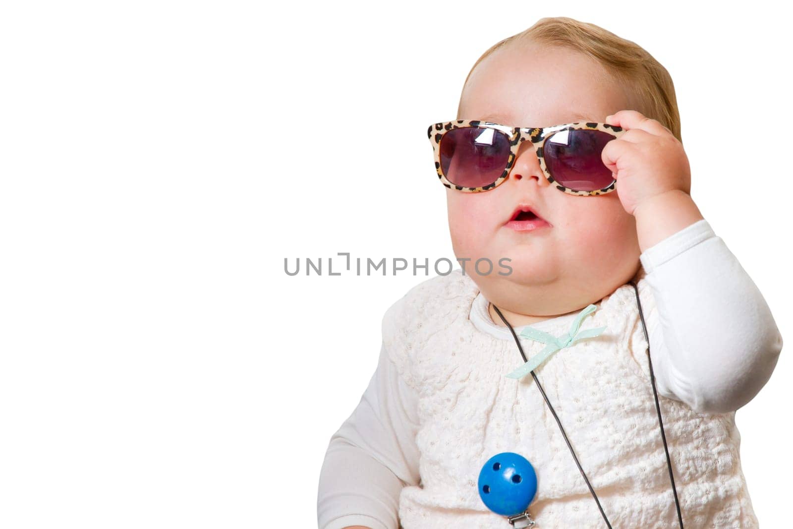 Baby with sunglasses,exposed on white background
