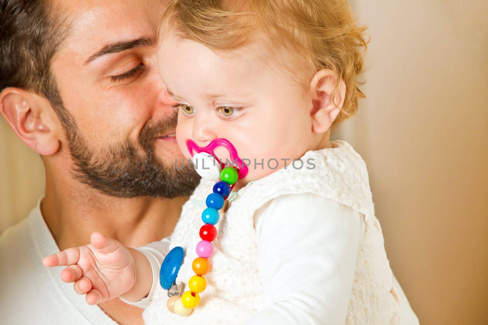 Father with child on his arm