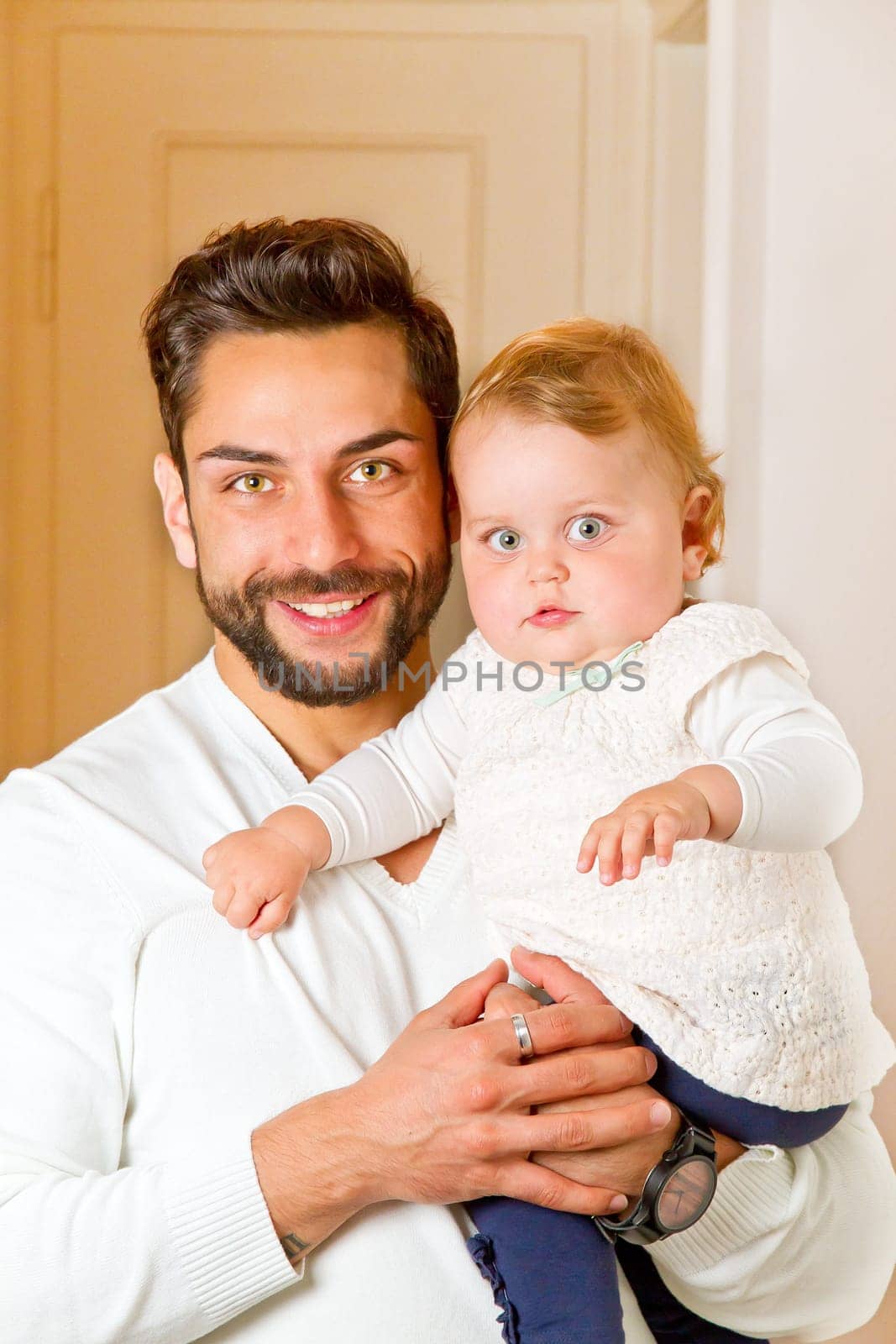 Father with child on his arm