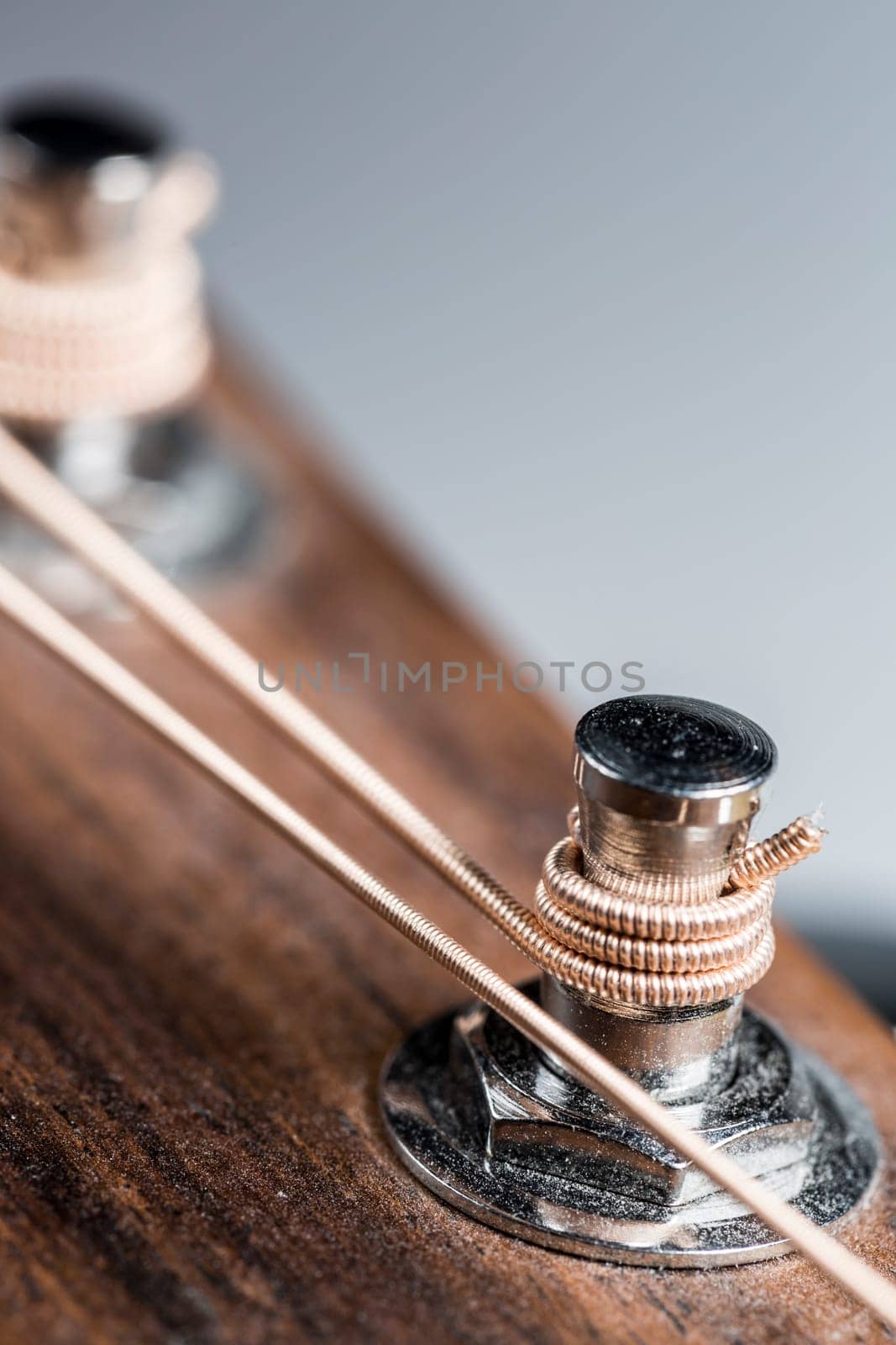 Steel Stringed Guitar Machine Head Part close up.
