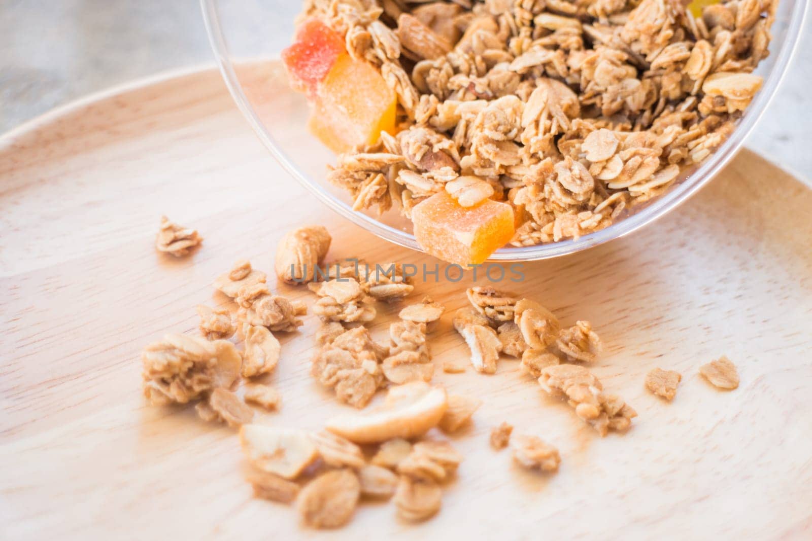 Homemade granola breakfast with dried fruit, stock photo