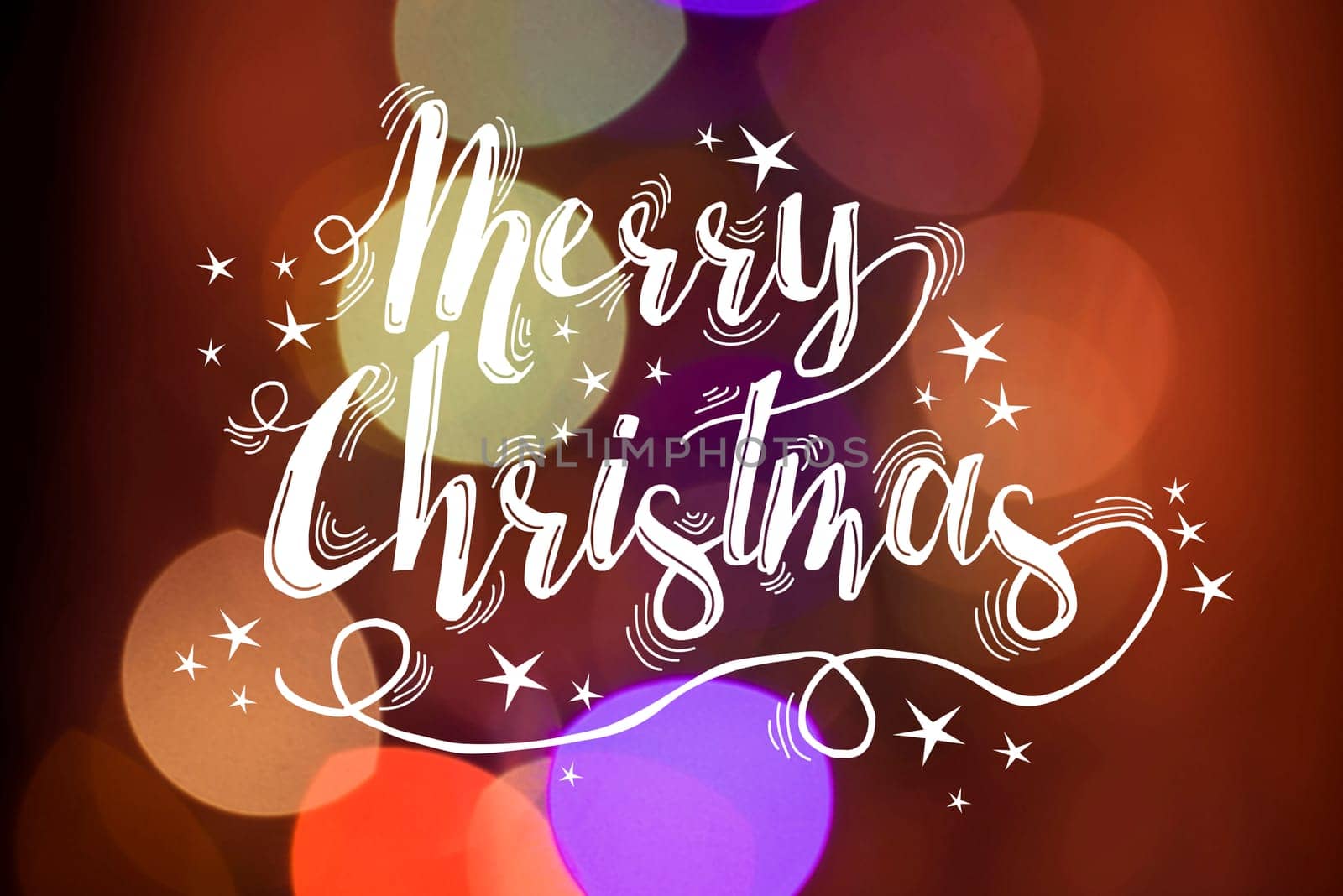 Merry christmas calligraphy with stars on bokeh light background. Ideal for xmas greeting card, holiday poster or web.