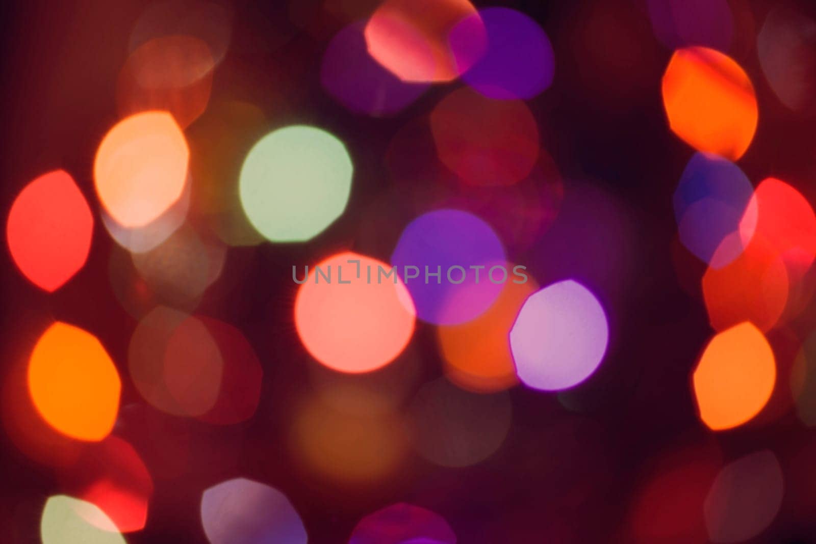 Abstract colorful blur light background with bokeh effect. Ideal for holiday greeting card, event invitation or web backdrop.