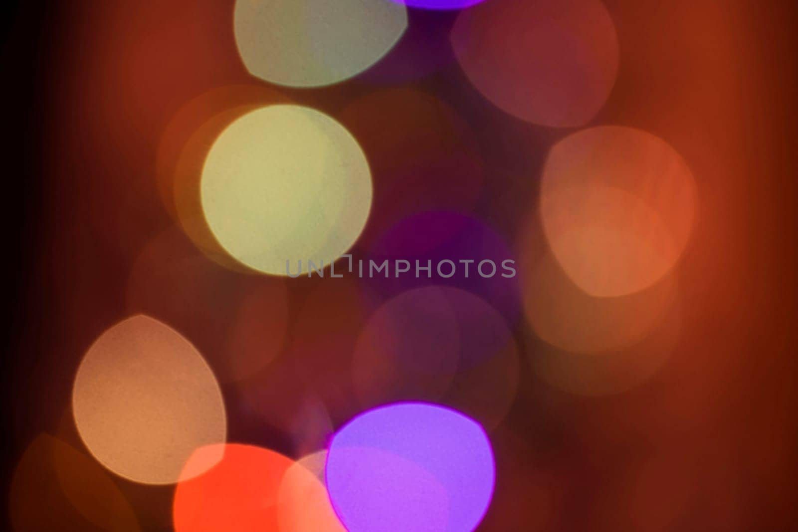 Defocused light blur background with bokeh style effect. Ideal for holiday greeting card, event invitation