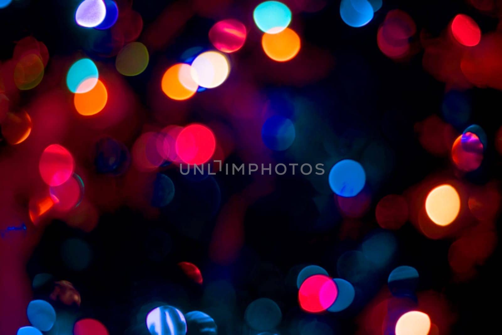 Blur party decoration lights, colorful abstract background. Ideal for greeting card, event invitation or web backdrop.   .