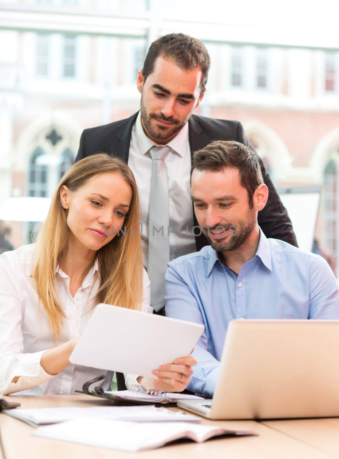 View of a Group of business people working together at the office