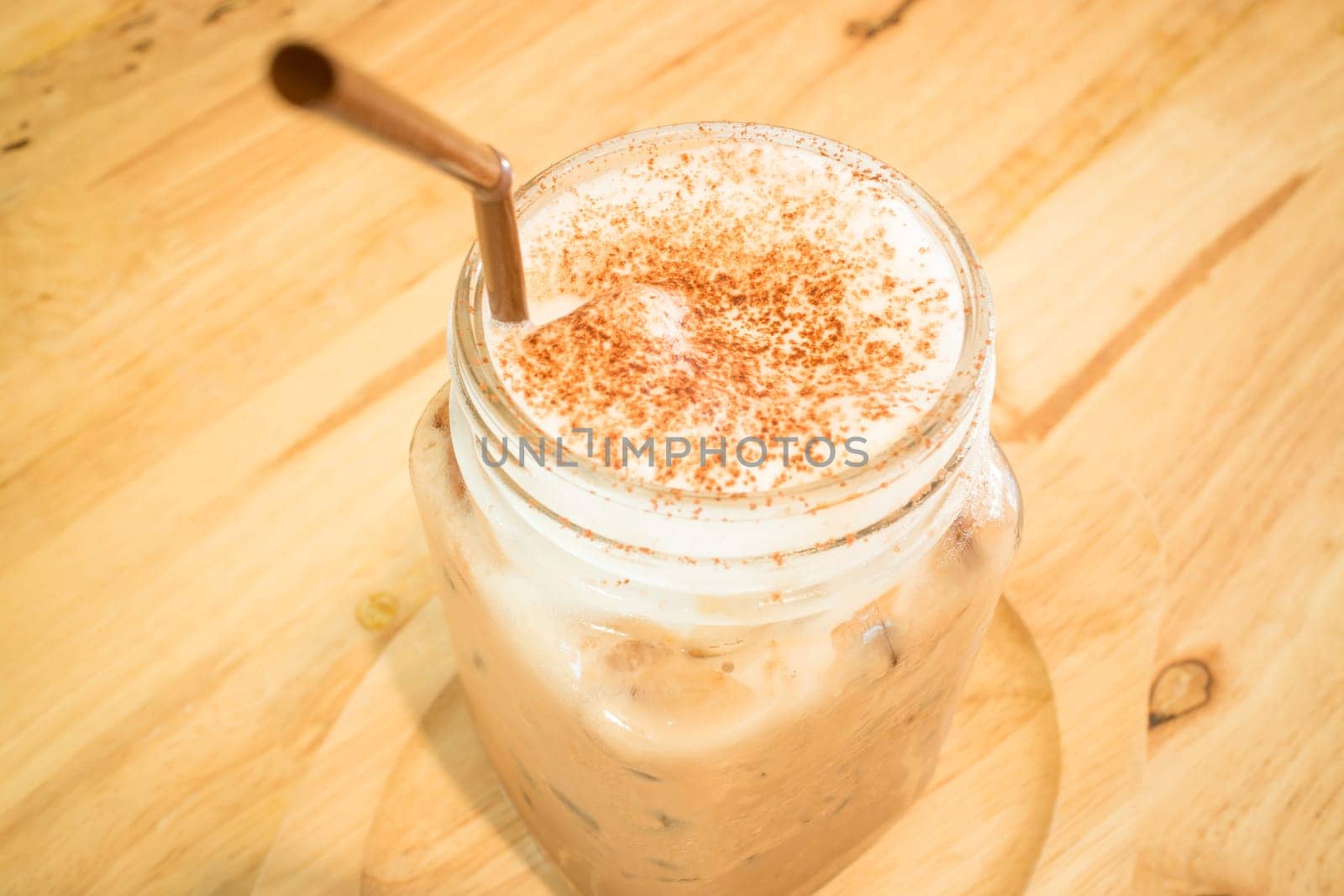 Iced cofee mocha drink serving on wooden table, stock photo