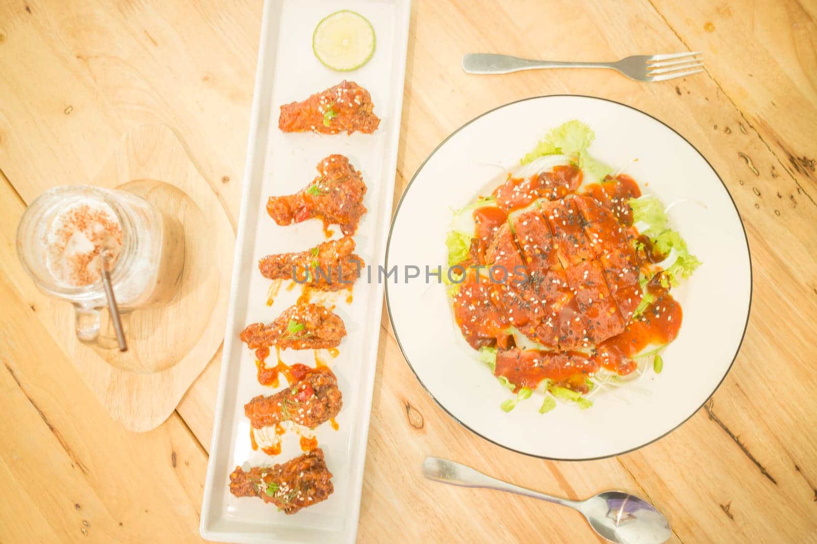 Set of spicy barbeque pork, chicken and iced coffee, stock photo