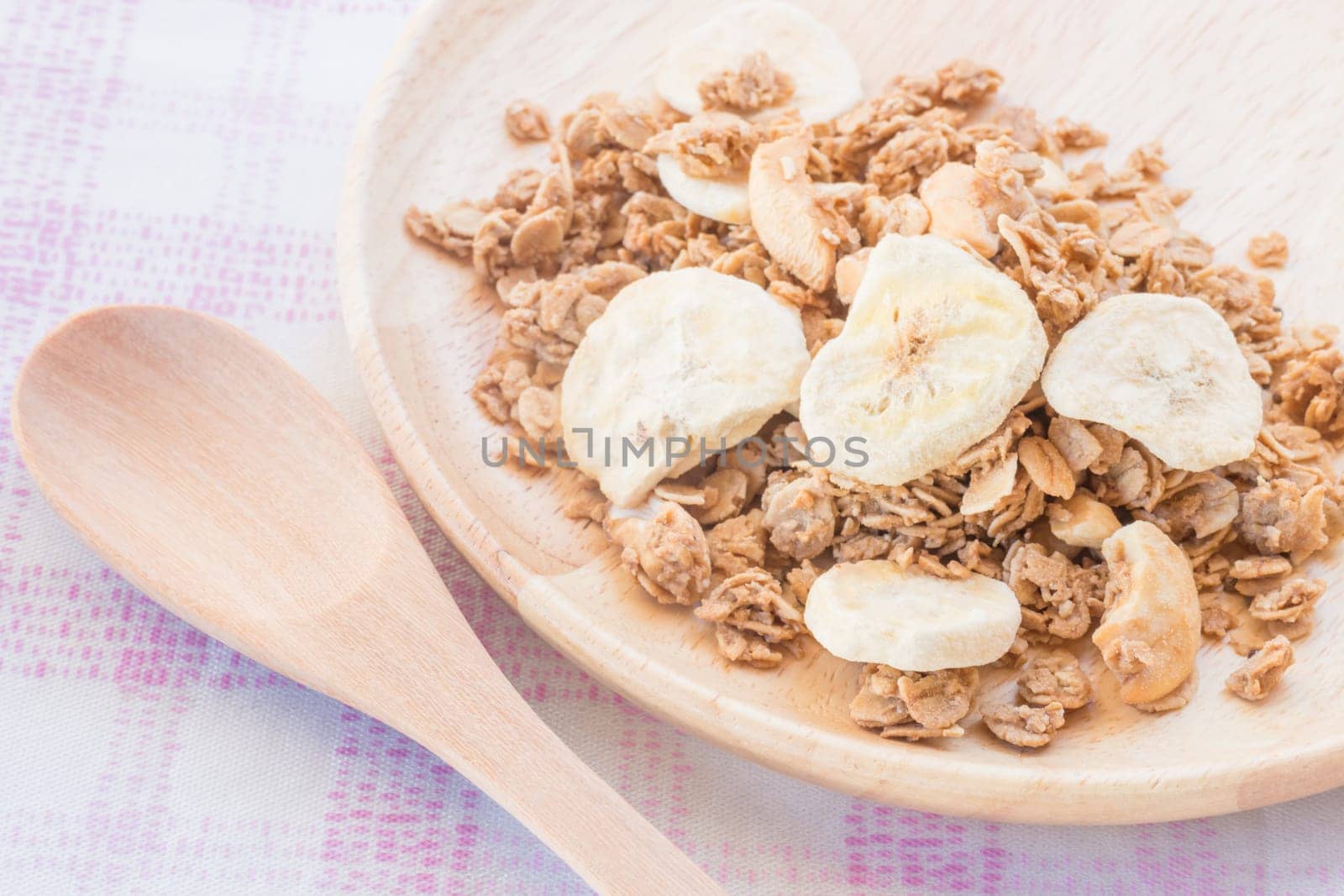Homemade granola breakfast with dried fruit, stock photo