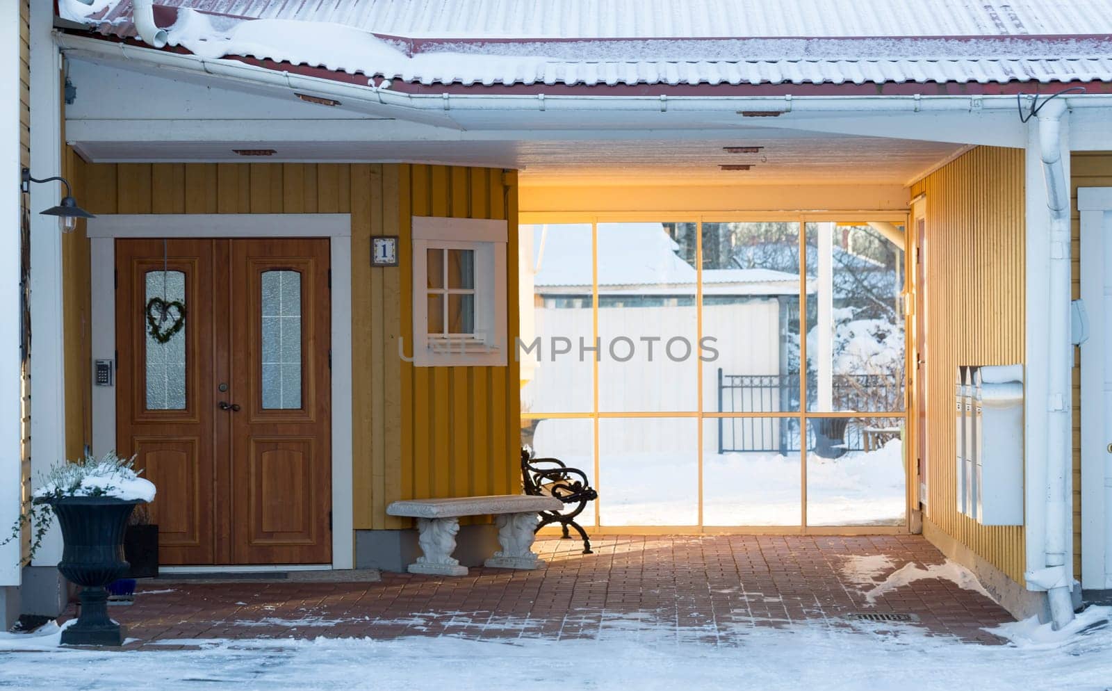 Entrance to House in Winter with snow.