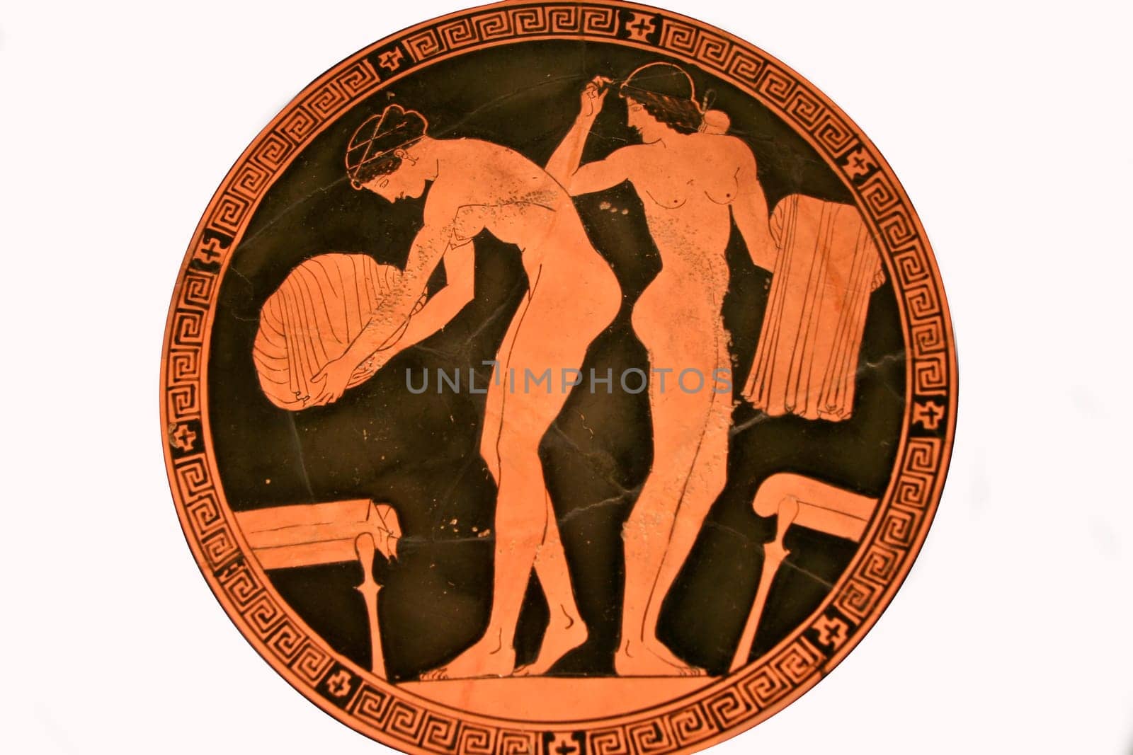 Ancient greek vase paintings in black over red ceramic. Isolated over white background