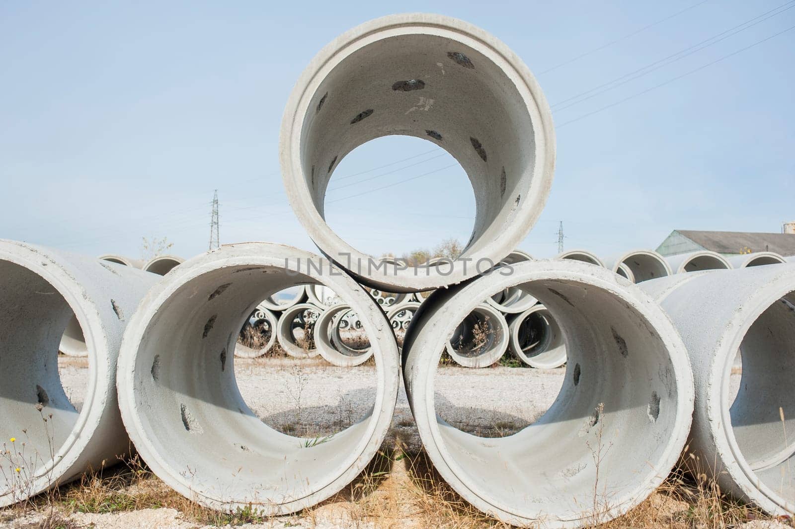 Concrete drainage pipes for industrial building construction.