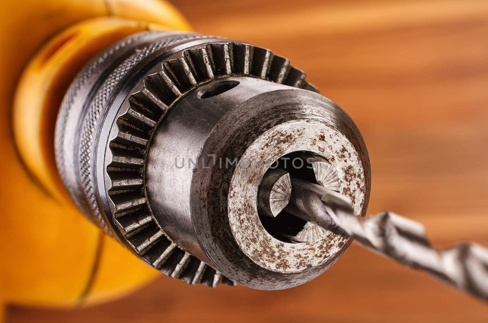 electric drill on a wooden background