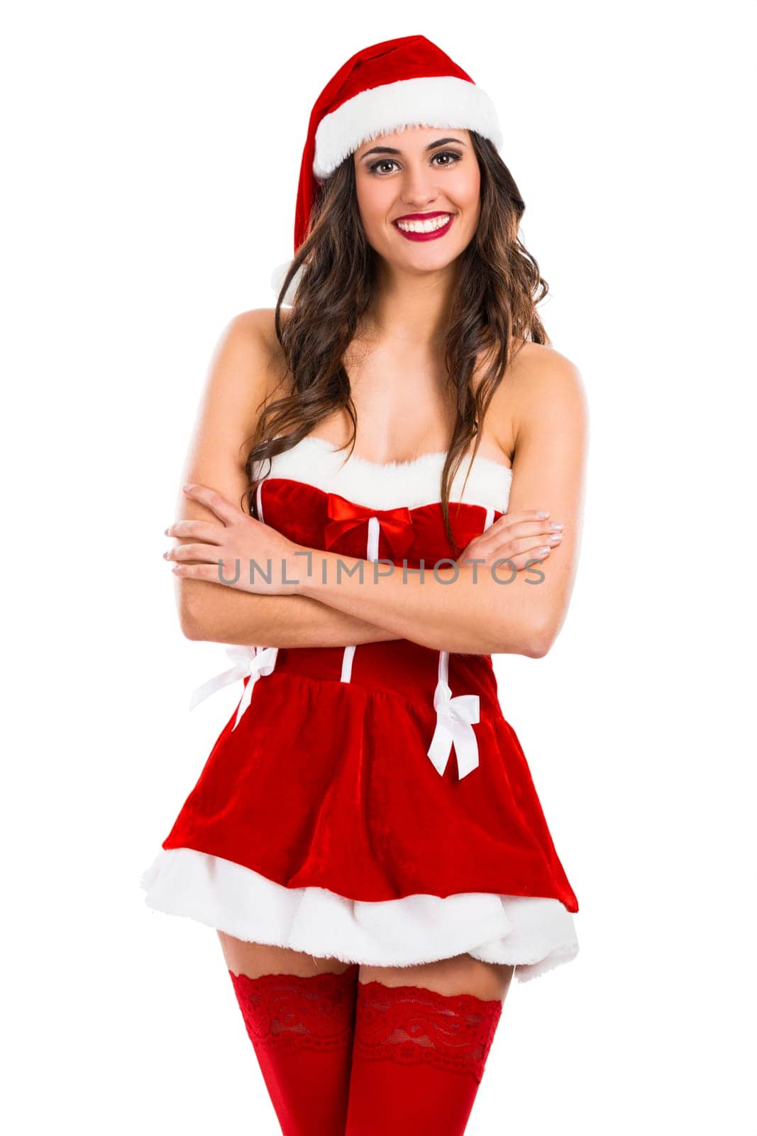 Beautiful and sexy woman wearing santa clause costume..