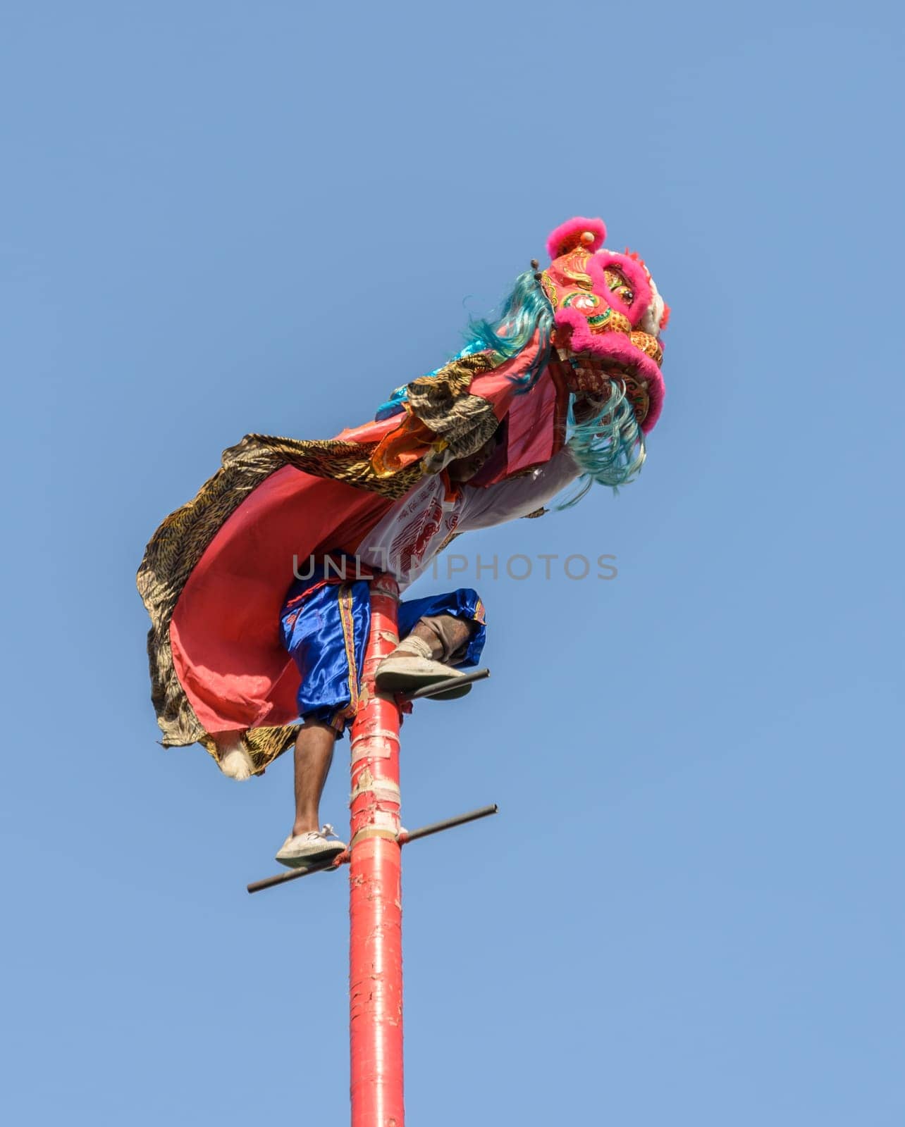 NAKHONSAWAN,THAILAND - FEBRUARY 13: Chinese lion dance performance for Chinese New Year Celebrations on February 13, 2013 in Nakornsawan, Thailand.